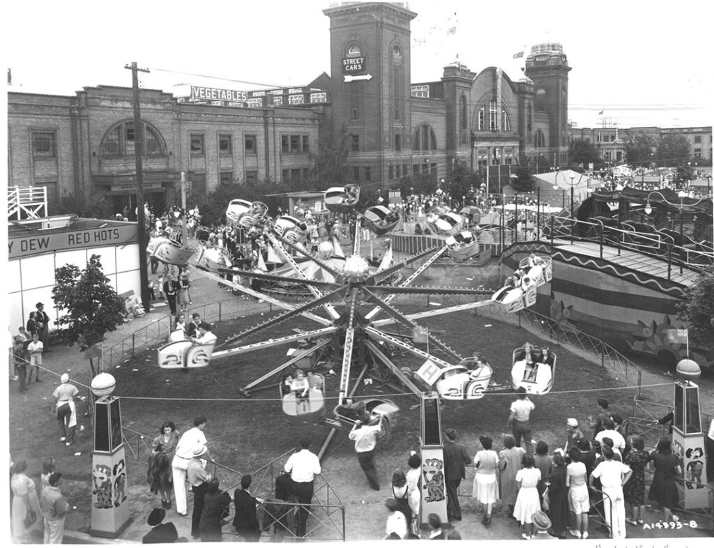 Coliseum with Midway Ride, ca. 1940 – CNE Heritage